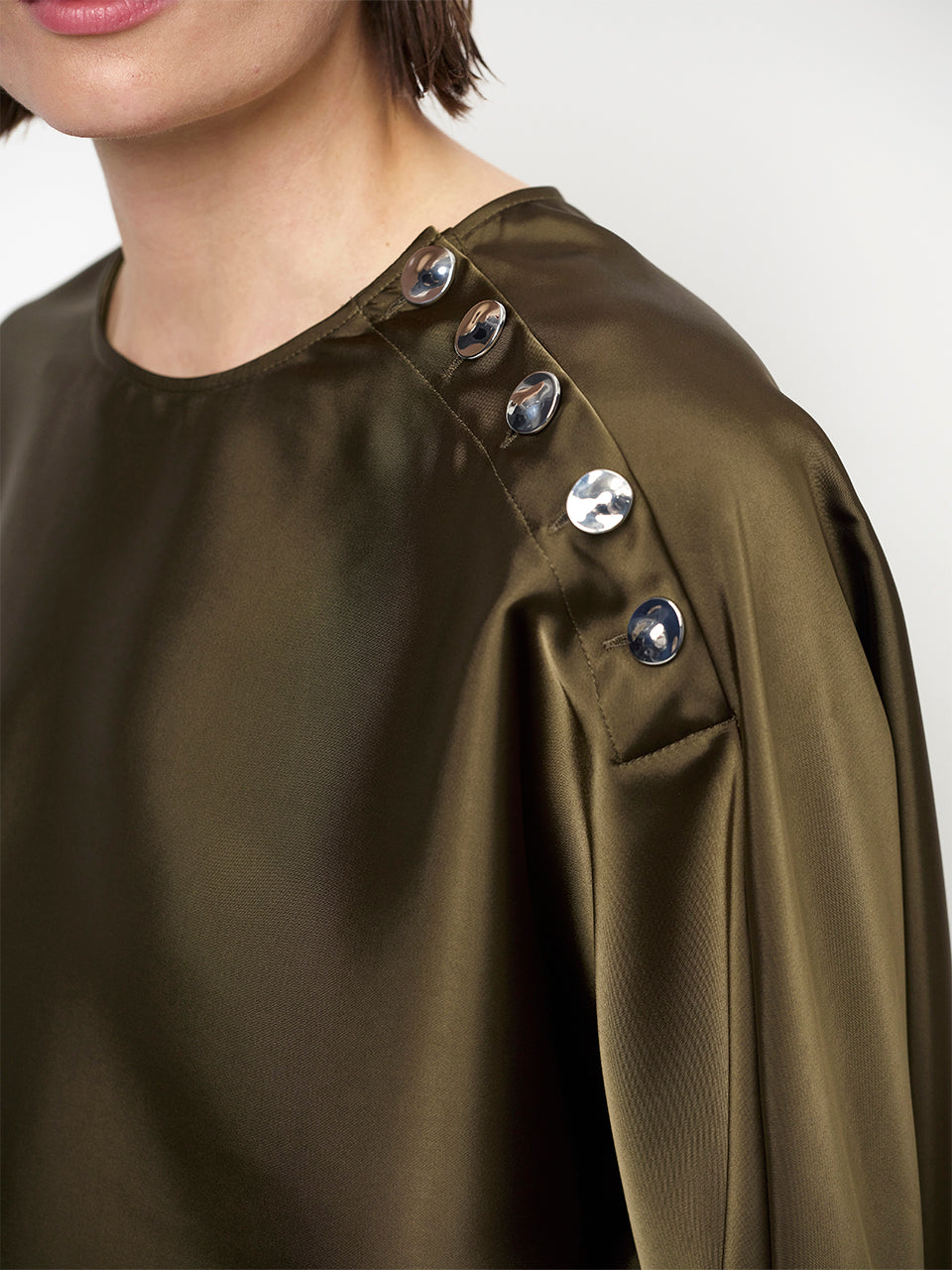 Dante6-Leiva bold satin button detail to