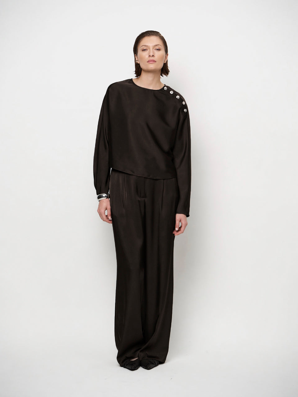 Dante6-Leiva bold satin button detail to